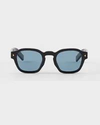 sonnenbrille mit ikonischer plakette aus metall